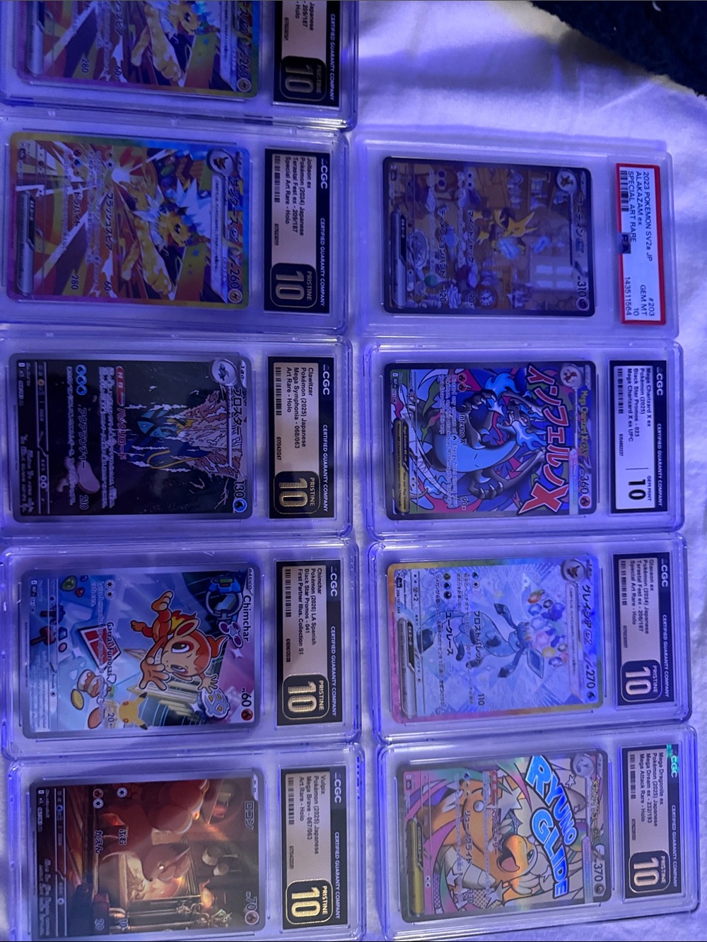 Assorted Graded CGC Pokémon Cards - alakazam, mega charizard, etc